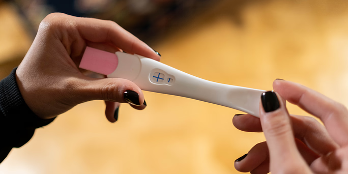 Woman wondering how pregnancy tests work