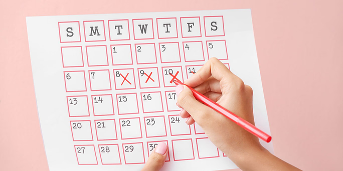 Woman wondering if you can get pregnant on your period
