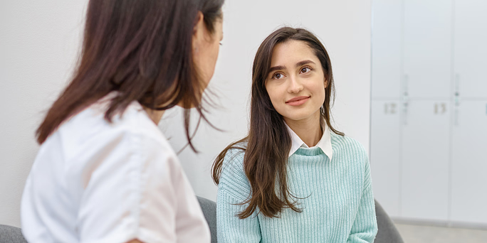 Woman learning what to know before abortion
