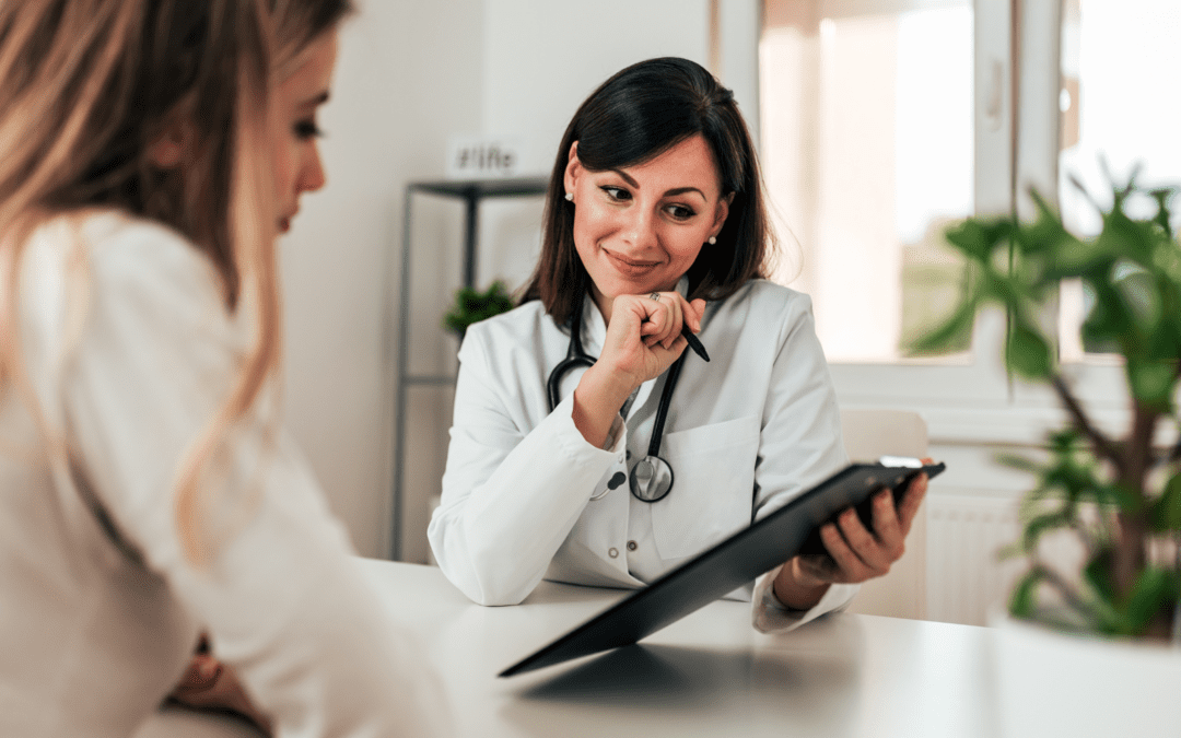 Woman talking to doctor about abortion options